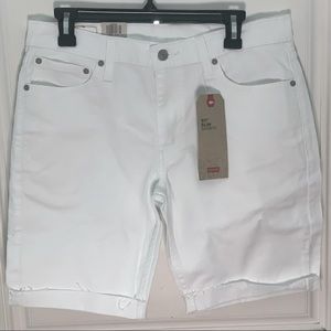 NWT Cute pair of white jean shorts these are a size 33.